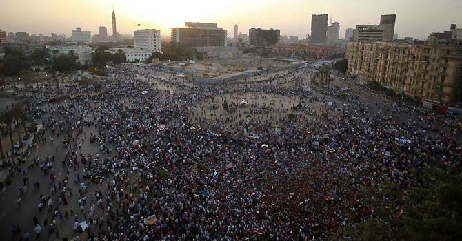Protesters demonstrate after a court sentenced deposed president Hosni Mubarak to life in prison at Tahrir Square in Cairo June 2, 2012. Mubarak was sentenced to life in prison on Saturday for ordering the killing of protesters during the uprising that swept him from power last year. REUTERS/Mohammed Salem (EGYPT - Tags: POLITICS CIVIL UNREST TPX IMAGES OF THE DAY)
