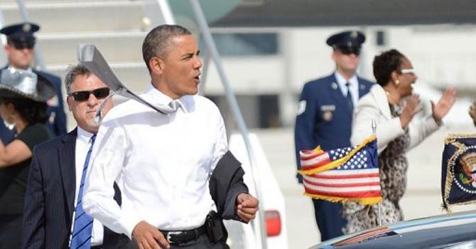 Obama told supporters in Miami Romney would use his cash bonanza to distort his record. - Photo by AFP