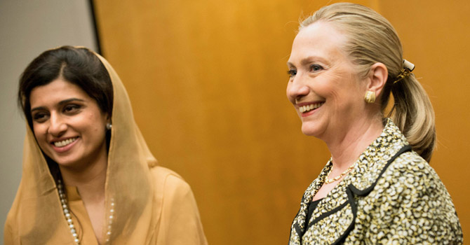 US Secretary of State Hillary Clinton (R) and Pakistan's Foreign Minister Hina Rabbani Khar.—AFP Photo