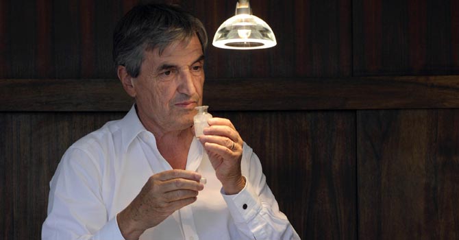 Jean-Claude Ellena, using perfume smelling strips at his home in the French southeastern city of Cabris.—AFP Photo