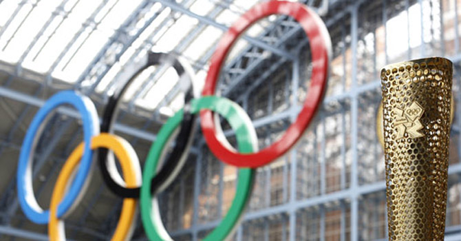 The relay torch for the London 2012 Olympic games is seen as it is unveiled at St Pancras station in central London.—AP Photo