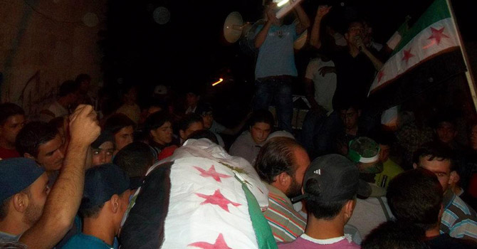 Residents carry the coffin of a man.—Reuters Photo