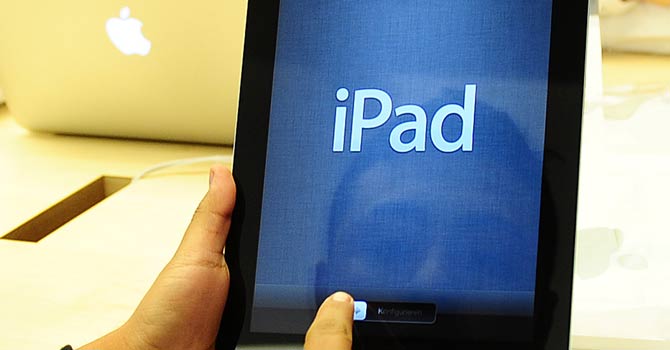 A man uses an Apple iPad – File photo by AFP