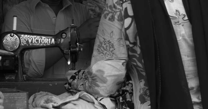 A Pakistani tailor – File photo by Creative Commons