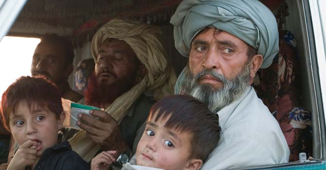 Internally Displaced Persons from the Waziristan tribal region leave their homes in 2009. – File photo by AP