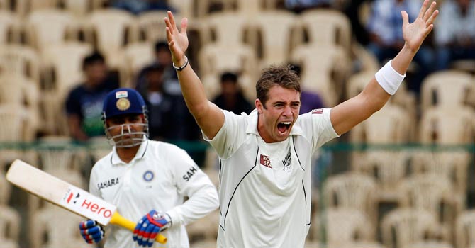 Tim Southee appeals unsuccessfully against Virender Sehwag. Southee eventually bagged Sehwag's wicket, and two others on the second day of the final Test in Bangalore. – Photo by Reuters