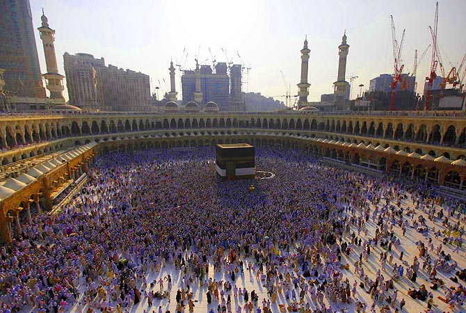 Muslim pilgrims circle the Kaaba and pray at the Grand mosque during the annual haj pilgrimage in Mecca