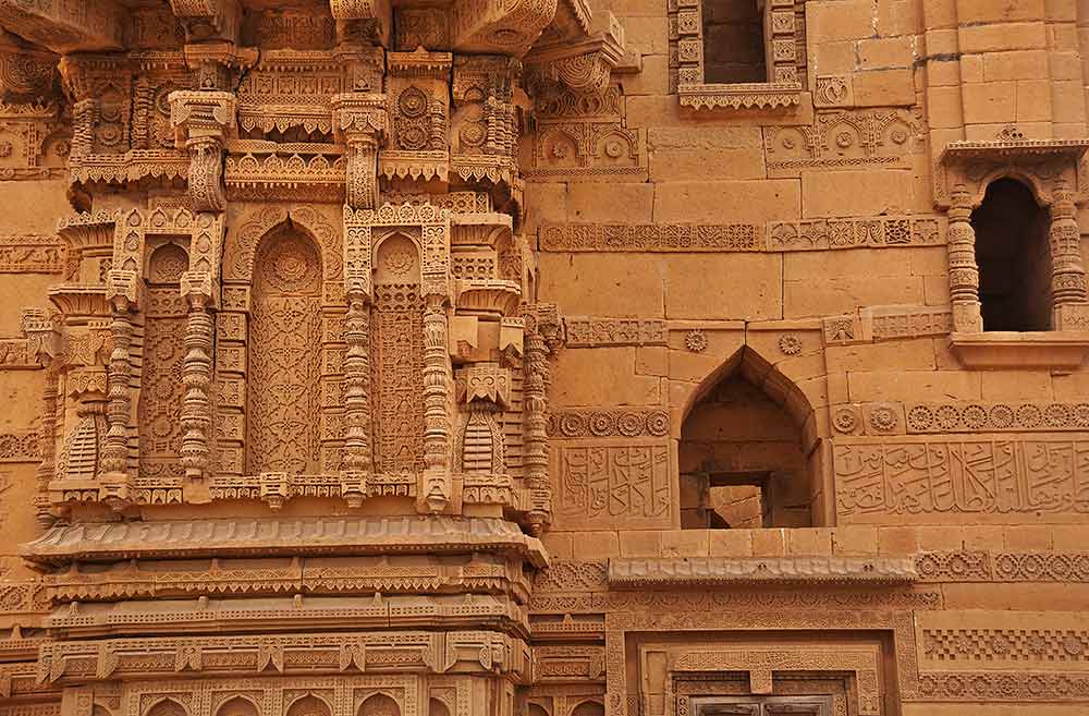 A partial view of the front ornamented wall of the tomb. Here too we see the basic design derived from Jain temple art but it is modified with the Islamic mehrab. - Photo by Nadir Siddiqi/Dawn.com