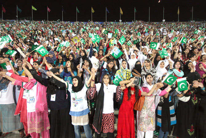 Patriotic emotions ran through the sky when around 70,000 participants of the Punjab Youth Festival joined voices with an aim to break the world record for the most people singing a National Anthem simultaneously at National Hockey Stadium. - Photo by INP