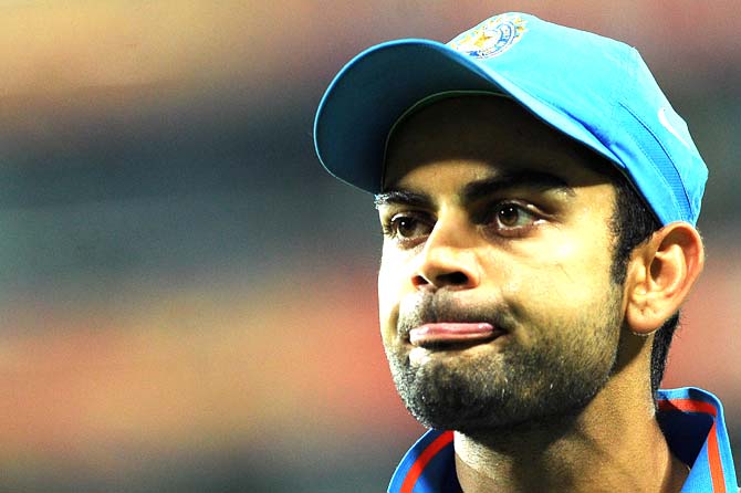 Virat Kohli reacts during the match – Photo by AFP