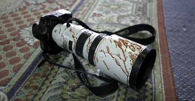 camera-with-blood-smeared-on-it670