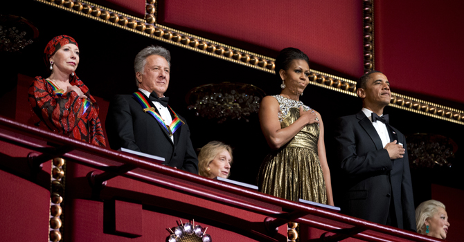 President Barack Obama, and first lady Michelle Obama with the 2012 Kennedy Center Honors recipients ballerina Natalia Makarova and actor and director Dustin Hoffman, stand as the National Anthem is played during the Kennedy Center Honors Gala at the Kennedy Center in Washington.—AP Photp