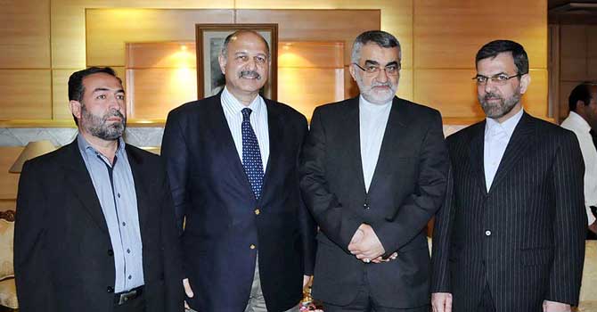 Senator Mushahid Hussain Syed meets his Iranian Counterpart Alaeuddin Borougerdi and other members of the Iranian delegation in Islamabad on Monday. – Photo by APP