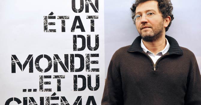 Syrian film director Meyar Al-Roumi poses on Nov 30, 2012 at the Forum de Images in Paris during the fourth edition of the “Un etat du monde... Et du cinema” (A state of the world... And cinema) festival. - AFP Photo