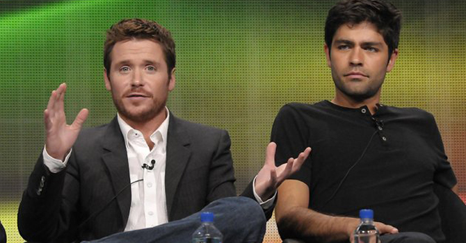 , actor Kevin Connolly, left, and actor Adrian Grenier speak during The Television Critics Association 2011 Summer Press Tour in Beverly Hills, Calif. — AP Photo