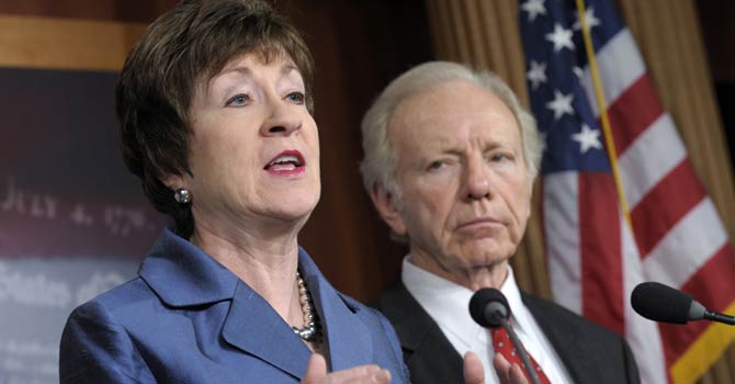 Senate Homeland Security Committee Chairman Sen. Joseph Lieberman, I-Conn. listens at right, as the committee's ranking Republican, Sen. Susan Collins, R-Maine speaks during a news conference on Capitol Hill in Washington, Monday, Dec 31, 2012, to discuss the committee's report on the security deficiencies at the temporary US Mission in Benghazi, Libya. - AP Photo
