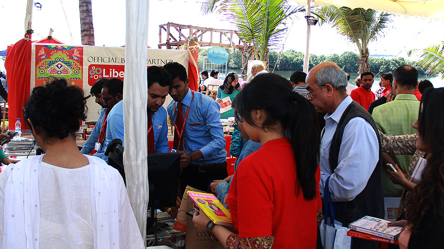 People at a bookstall at the Karachi Literature Festival 2013 — Shameen Khan/Dawn.com