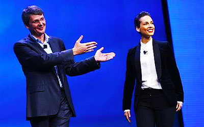 Research in Motion (RIM) President and Chief Executive Officer Thorsten Heins (L) introduces singer songwriter Alicia Keys as the 'global creative director' during the launch of the RIM Blackberry 10 device in New York. —Photo by Reuters