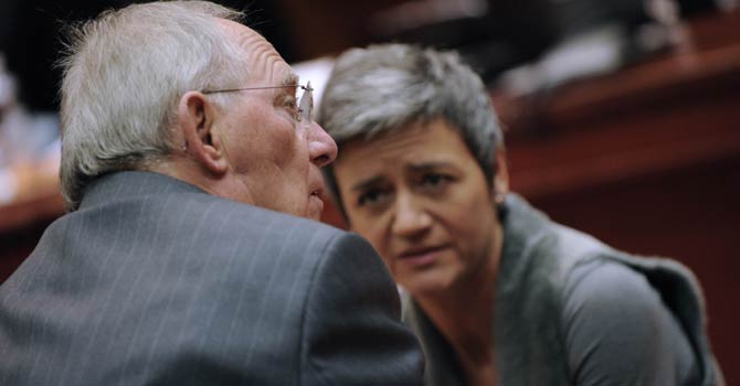 (L to R) German Finance Minister Wolfgang Schaeuble talks with Danish minister Economy and Interior Margrethe Vestager prior to an Economic and Financial Affairs meeting on Feb 12, 2013 at the EU Headquarters in Brussels. - AFP Photo