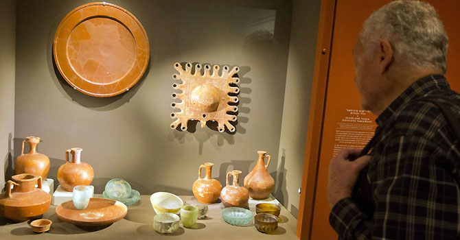 Earthenware artifacts are displayed behind glass as part of the 'Herod the Great: The King's Final Journey' exhibition at the Israel Museum. —Photo by AFP