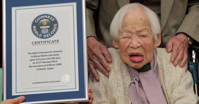 Japanese 114-year-old Misao Okawa, poses with Guinness World Records certificate. —Photo by AP