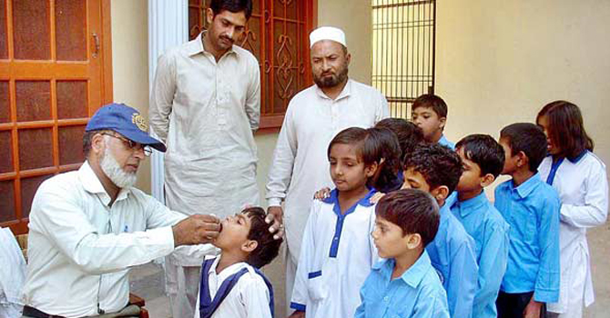 Polio drops being administered in Paksitan. – File photo by White Star