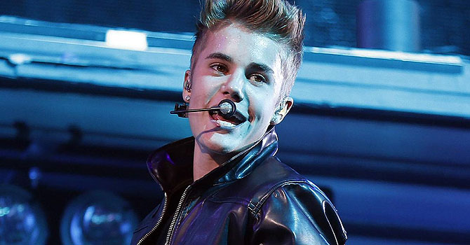 Justin Bieber performs at the MGM Grand Garden Arena in Las Vegas. Bieber is recovering after fainting backstage at a concert in London on Thursday, March 7, 2013. A spokeswoman for Bieber said that the 19-year-old pop star was given oxygen and took a 20-minute reprieve after fainting backstage at his show at London's O2 Arena. 