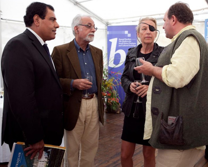 Rashid Rehman (second from left) in conversation with British author William Dalrymple (right) in 2012.