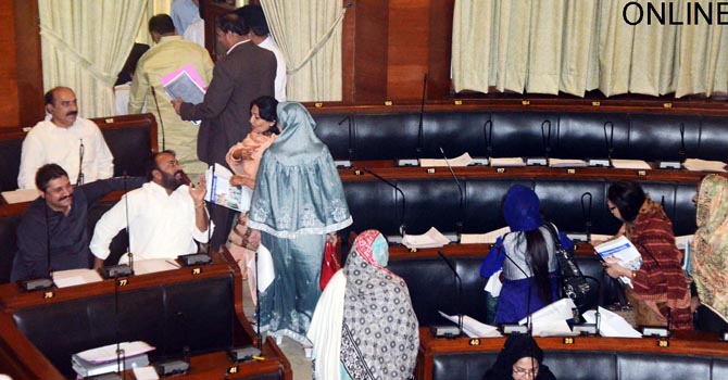 MQM MPAs stage walk out as they boycott session of Sindh Assembly in a protest against passing of Sindh Jinnah University bill.ONLINE PHOTO by Anwar Abbas