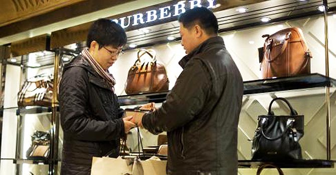 Chinese tourists in Harrods. —Photo by AFP