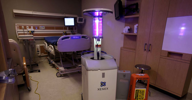 Using ultraviolet light, a machine disinfects a hospital room at the Westchester Medical Center in New York. —AP Photo