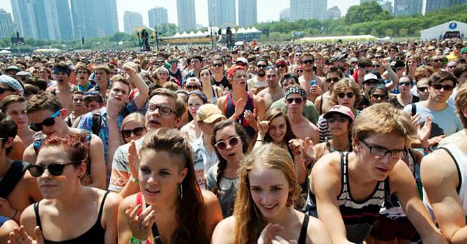 Fans gathering for a performance by Yellow Ostrich XX at Lollapalooza in Chicago's Grant Park in 2012. —Photo (File) AP