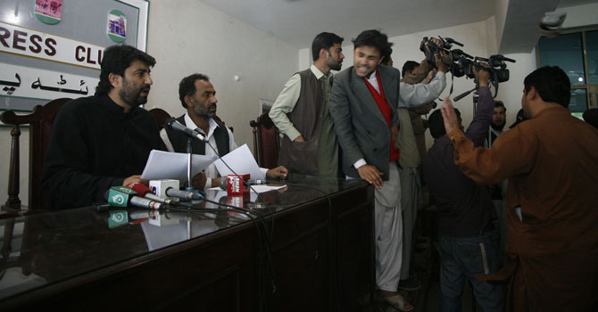 PTI workers at the Quetta Press Club. - Dawn.com