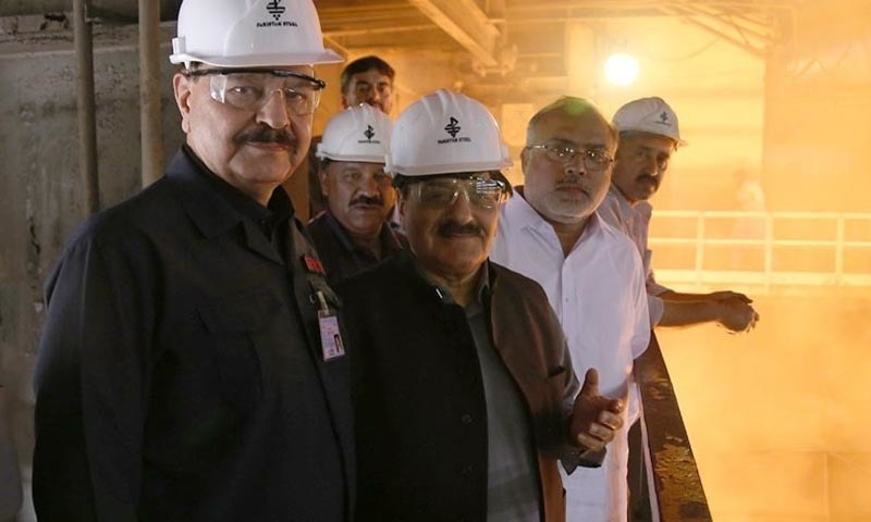 In this file photo, Ahmed is at the centre with his hand raised