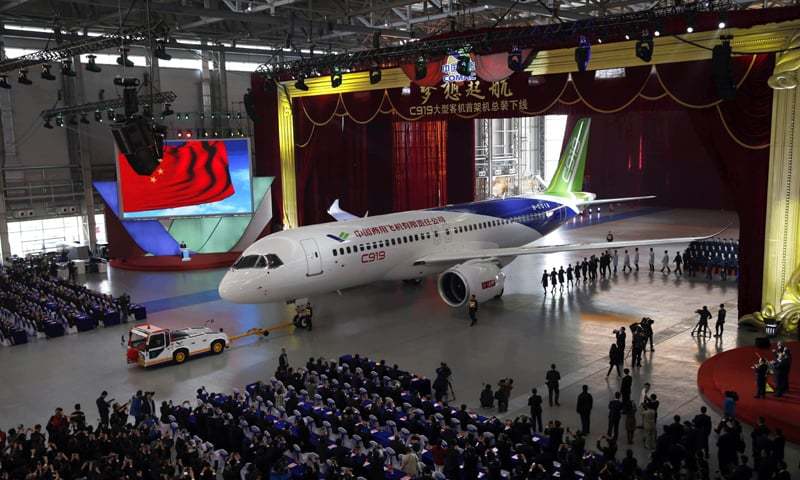 China unveils jetliner in bid to compete with Boeing, Airbus ...