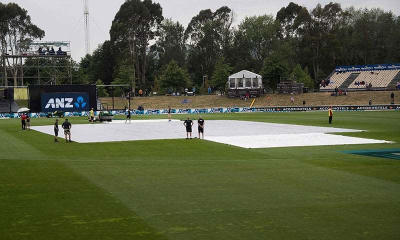 The covers lay on the field as the rain falls during the second ODI match between New Zealand and Pakistan at Saxton Oval in Nelson. — AFP