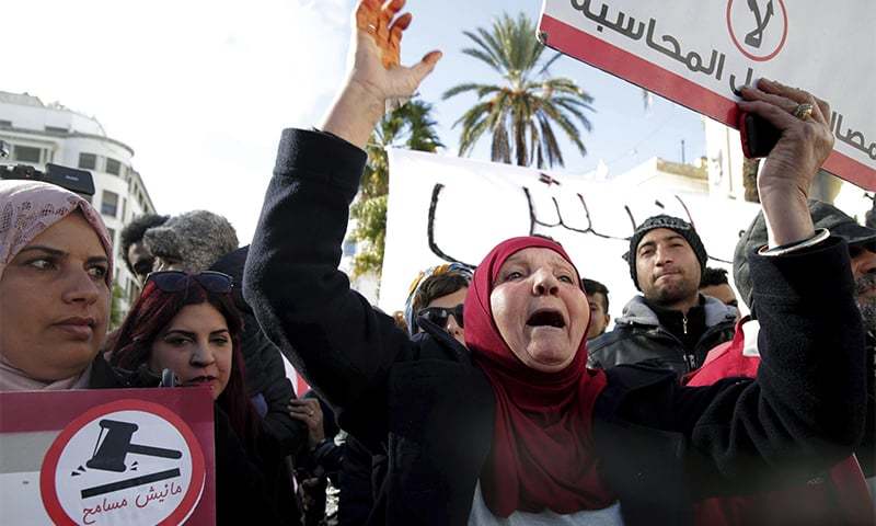 Family members of Tunisian who died in the revolution seven years ago stage a protest in Tunis Tunisia on Saturday