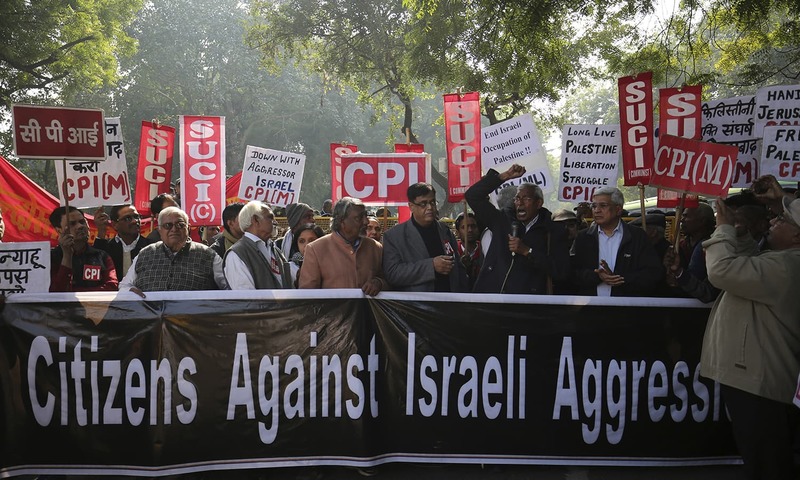 People hold placards during a protest by members of India’s various left parties and civilians against the visit of Israeli PM Netanyahu — AP