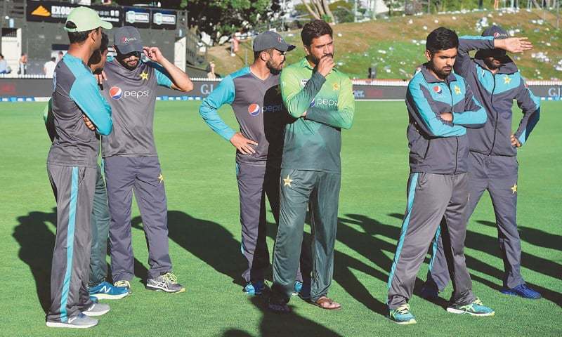 WELLINGTON: Pakistan cricketers give a dejected look during the post-series ceremony at the Basin Reserve on Friday.—AFP