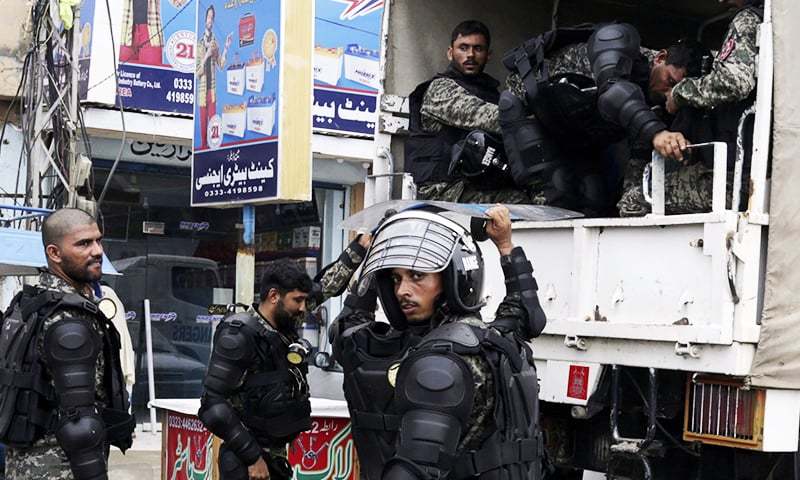 Paramilitary troops arrive in Lahore for maintenance of law and order in run-up to Nawaz Sharif and Maryam Nawaz's arrival at Lahore airport. ─ AP
