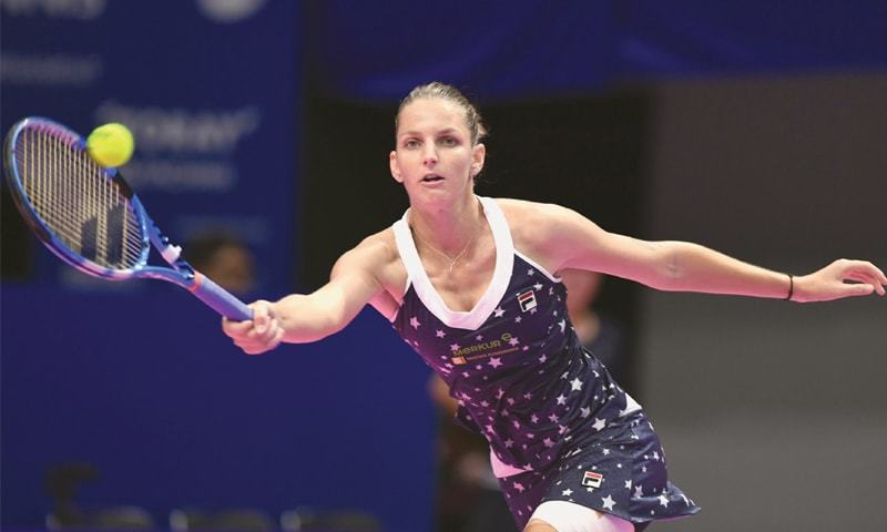 TOKYO Karolina Pliskova of the Czech Republic hits a return to Japan’s Naomi Osaka during the Pan Pacific Open final on Sunday.—AFP