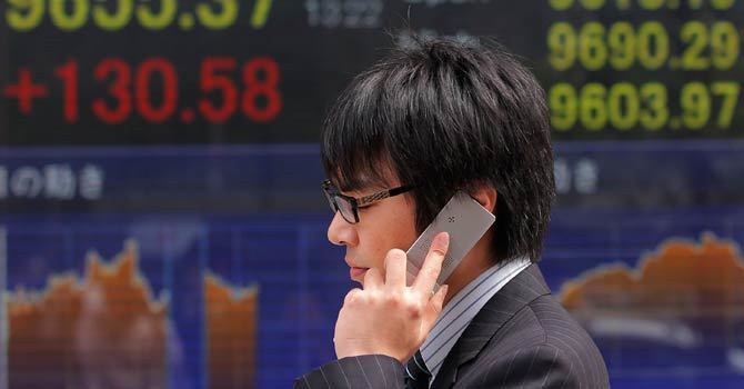 Trader at Tokyo Stock Exchange â€” File Photo