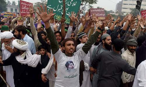 TLP supporters shout slogans at a demonstration in Lahore. — AFP/File