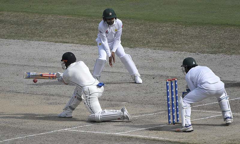 New Zealand's batsman Henry Nicholls plays a shot during the Test match against Pakistan on Tuesday.  — AP