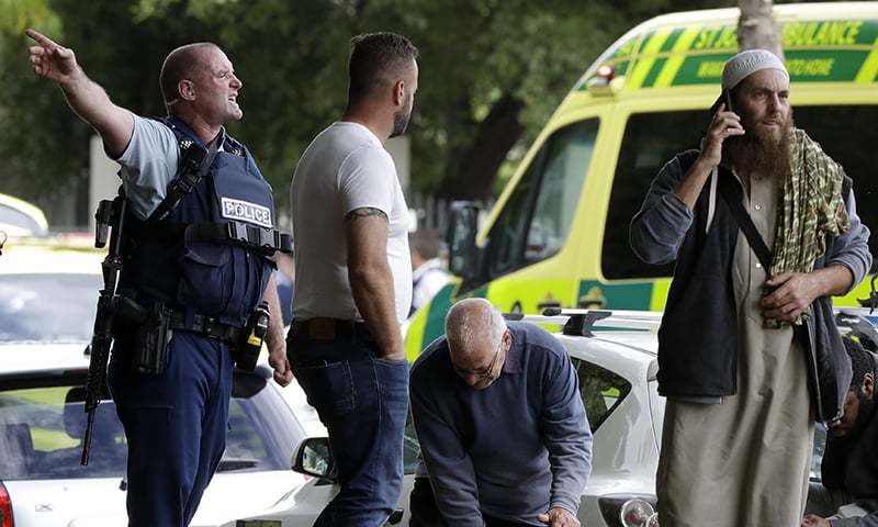 Police attempt to clear people from outside a mosque in central Christchurch, New Zealand, Friday, March 15, 2019. â AP