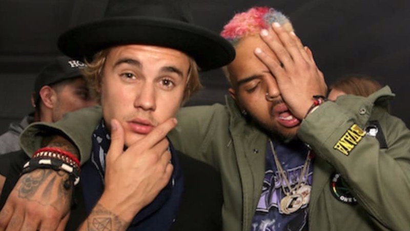 Justin Bieber called Chris Brown's domestic assault a mistake and fans are not happy