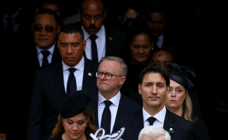 Canada’s Prime Minister Justin Trudeau, his wife Sophie Trudeau and Jamaica’s Prime Minister Andrew Holness leave Westminster Abbey after a service on the day of the state funeral and burial of Britain’s Queen Elizabeth, in London on Monday. — Reuters