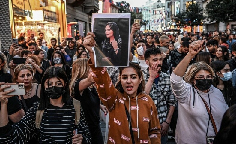Protests flare across Iran in violent unrest over woman’s death