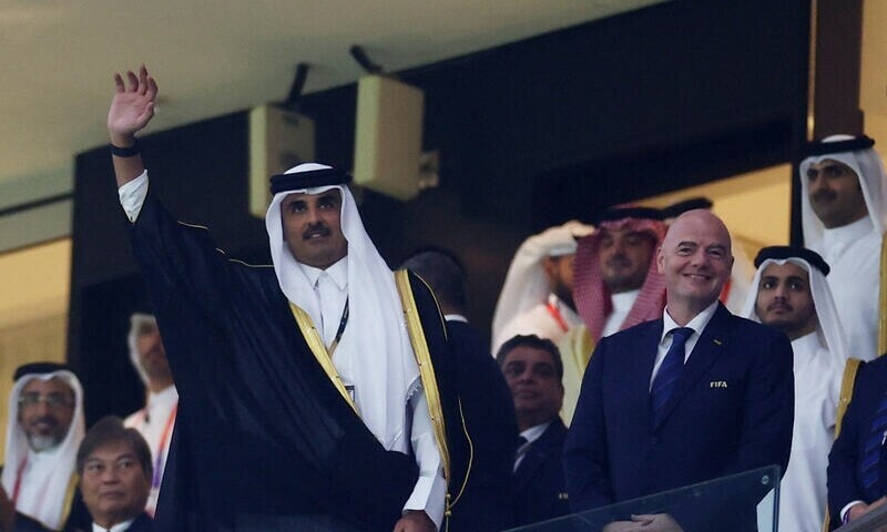 Qatar's Emir Sheikh Tamim bin Hamad al-Thani arrived at the stadium flanked by FIFA president Gianni Infantino, and took their seats alongside other Arab leaders. — Reuters