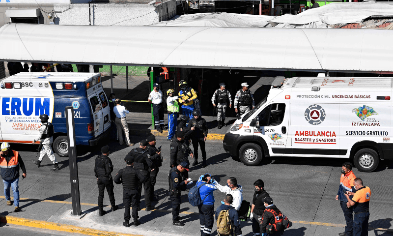 Members of rescue teams are seen at the Indios Verdes metro station after two trains collided in Mexico City on January 7. &mdash; AFP
